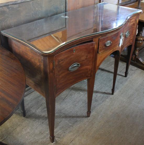 George III mahogany serpentine-fronted sideboard